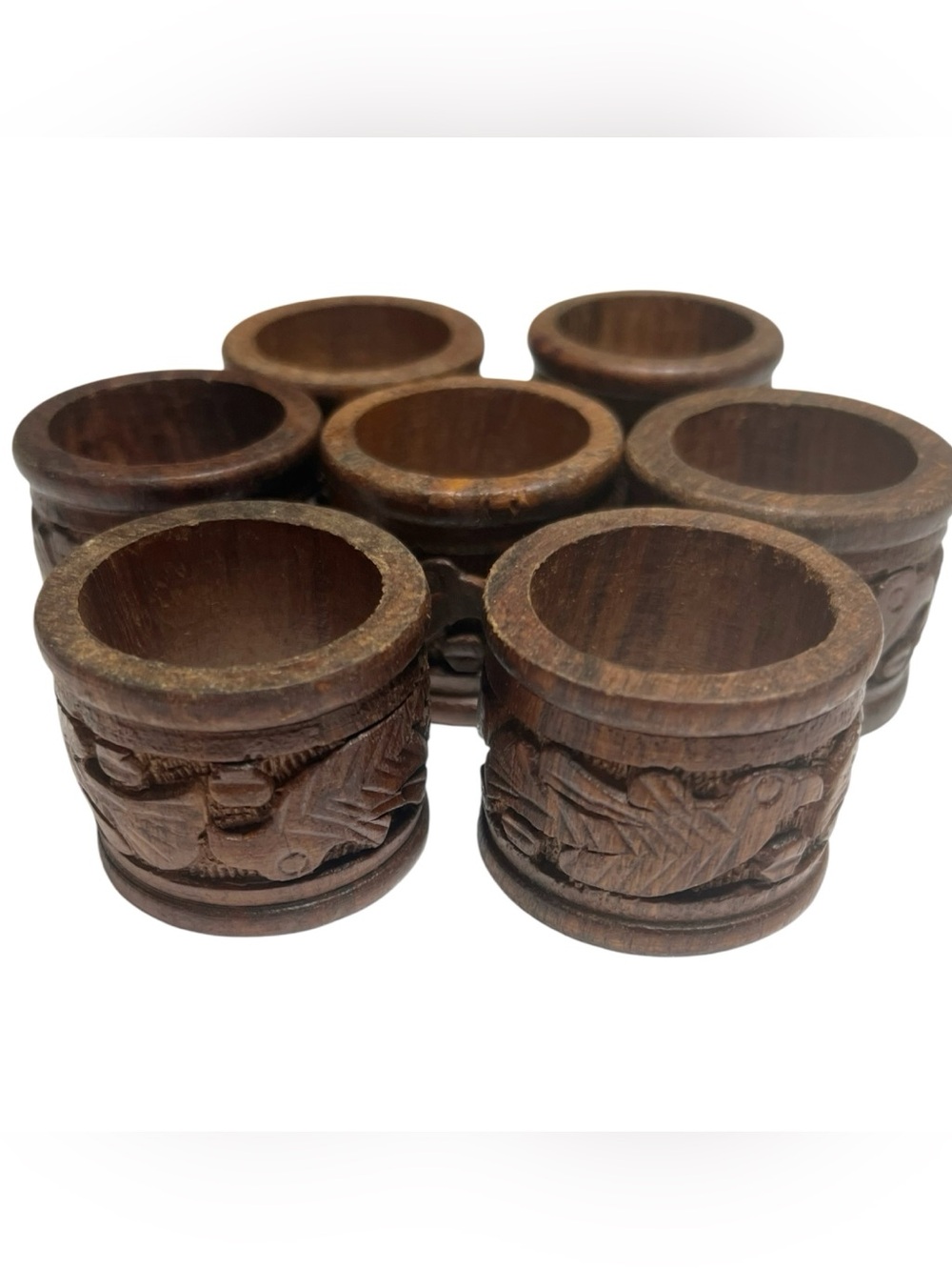 Carved Wood bird motif napkin rings set of 7 brown